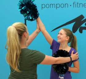 Mid American Studio instructor working one on one in a private lesson with a teenage girl.