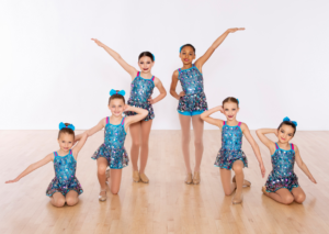 Tap Dancers Ages 5-8 on picture day in their Blue Recital Costume